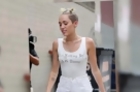 Miley Cyrus Looks All White As She Rocks Pig Tails in the Rain