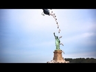 Red Bull Cliff Diver Heli-Dives in Front of Statue of Liberty